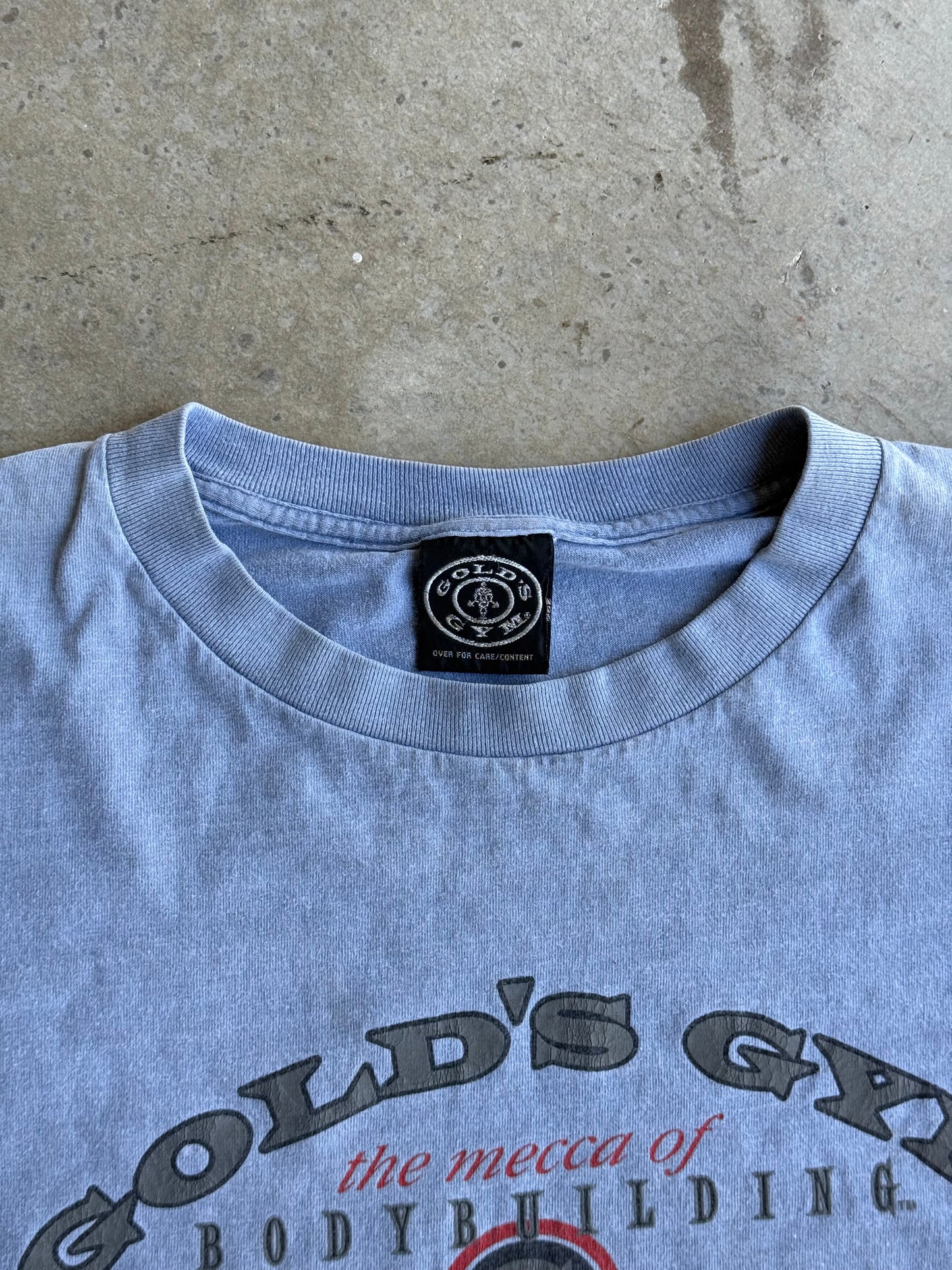 Vintage Cropped & Faded Blue Golds Gym Tee - L